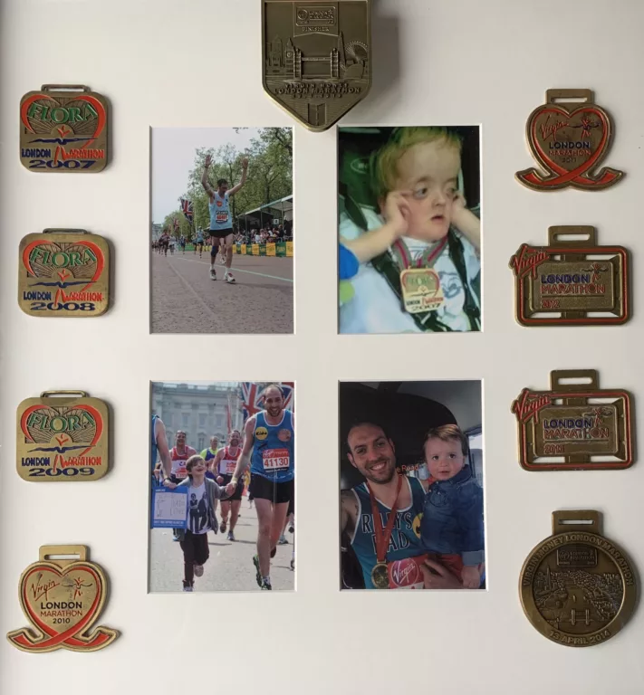 Photos of Terry and his son sit in a frame, alongside medals from Terry's previous London Marathons.