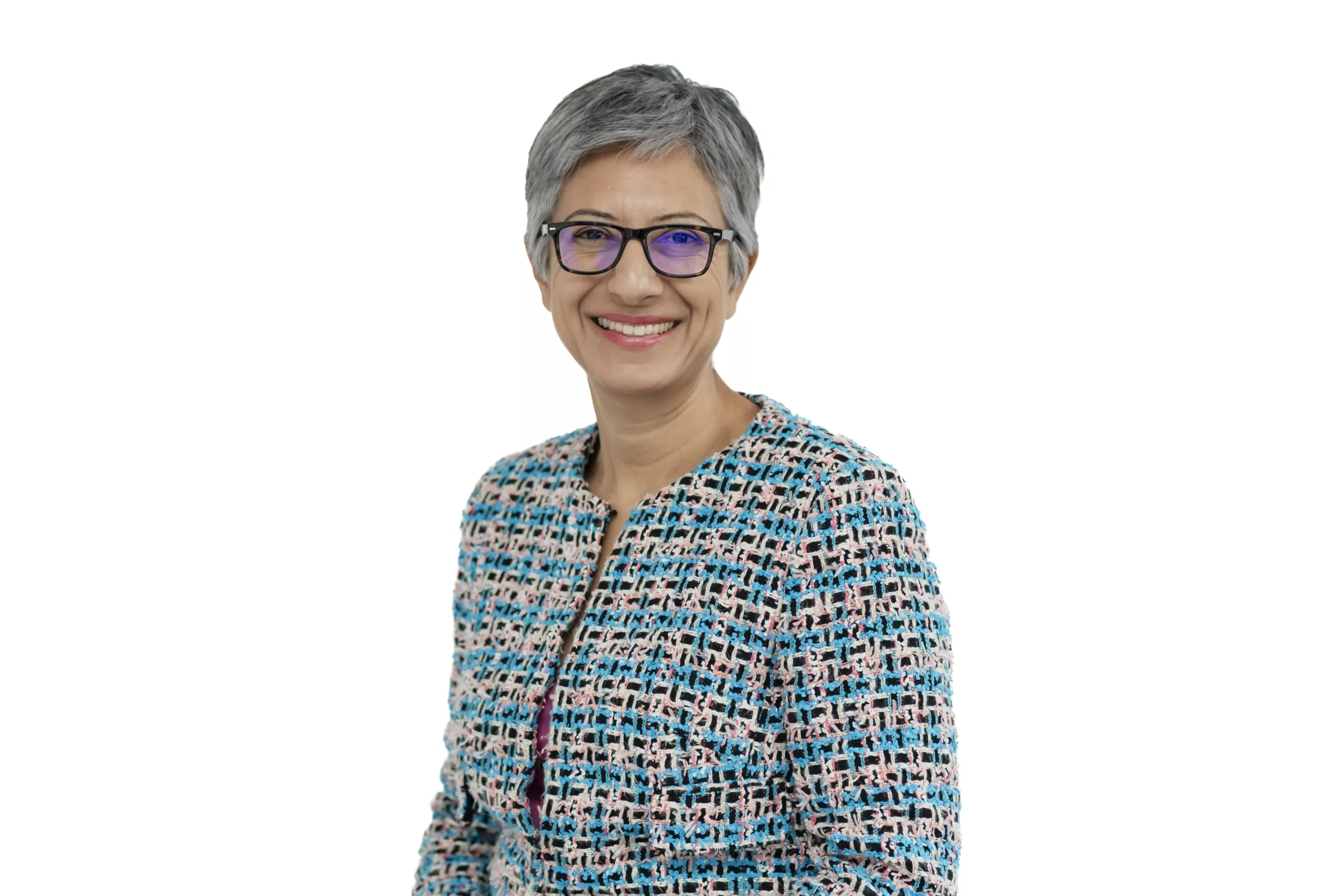 Katie Ghose is photographed from the waist-up.